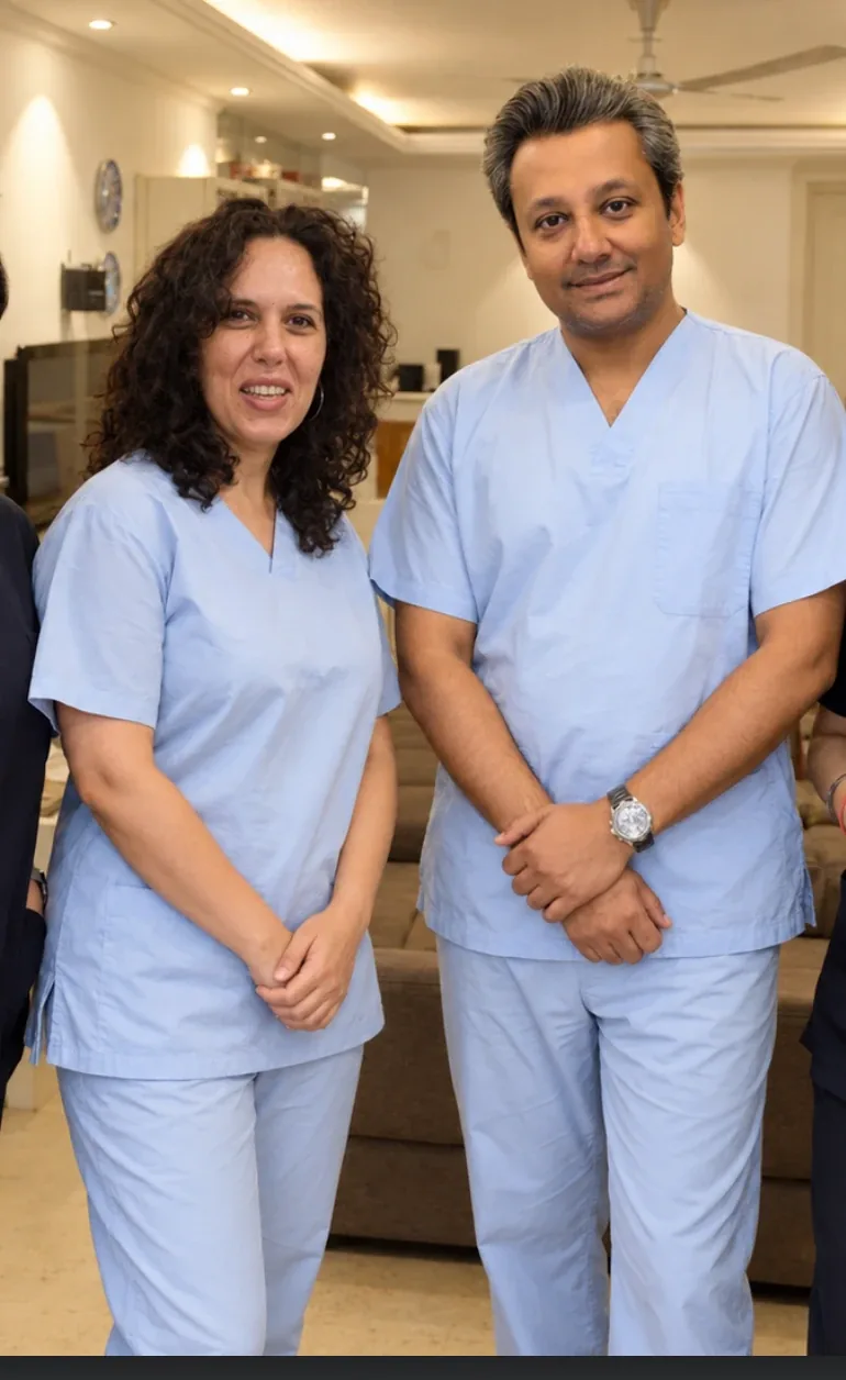 Dr Natalia DeSilva and Dr Anupam Sinha, the doctors of Orion Dental Clinic, standing together in the clinic